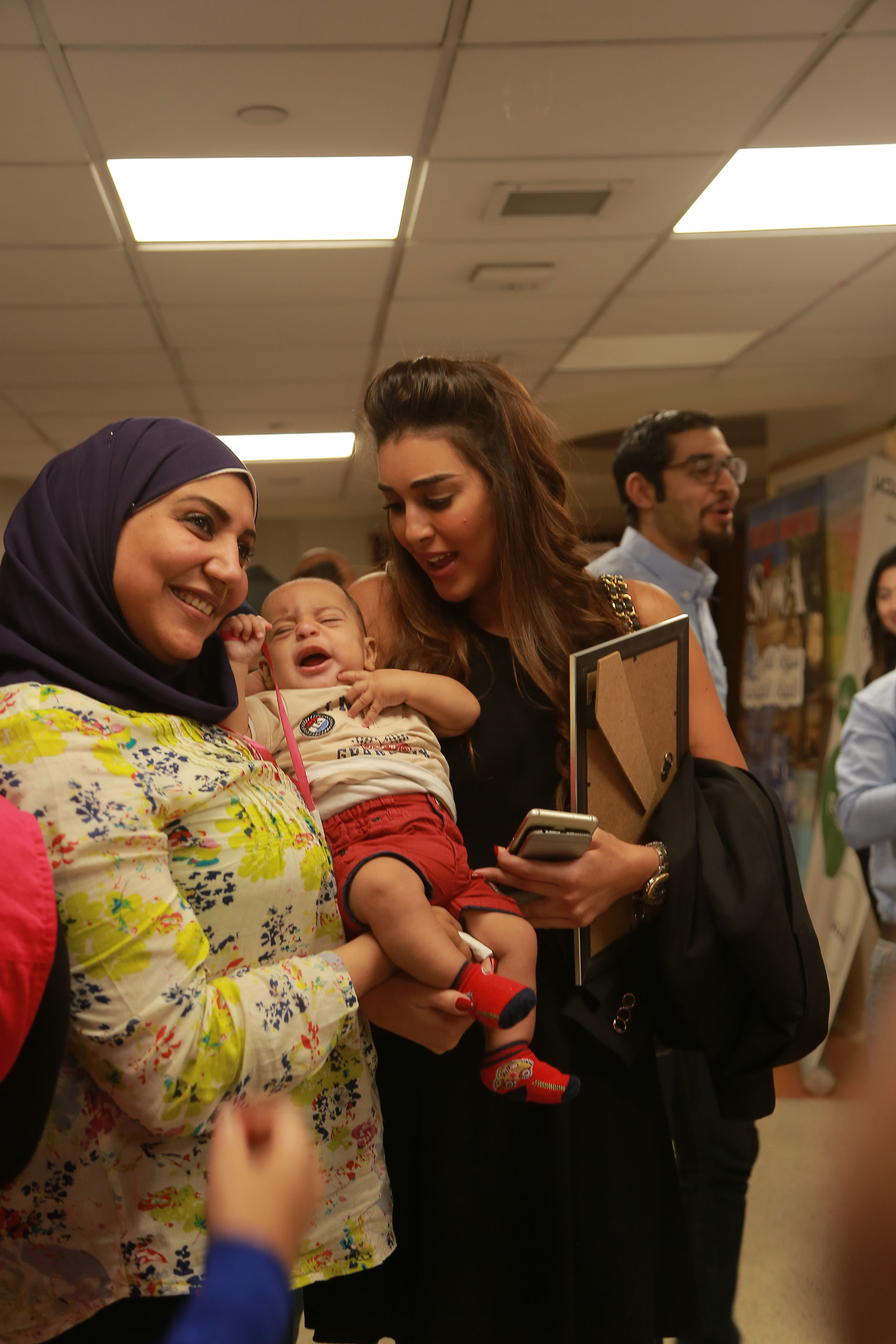 Actress Yasmine Sabry with attendees at an event held by the Misr Foundation for Health and Sustainable Development at the 57357 Children's Cancer Hospital. Photo courtesy of "You Are More Important" campaign