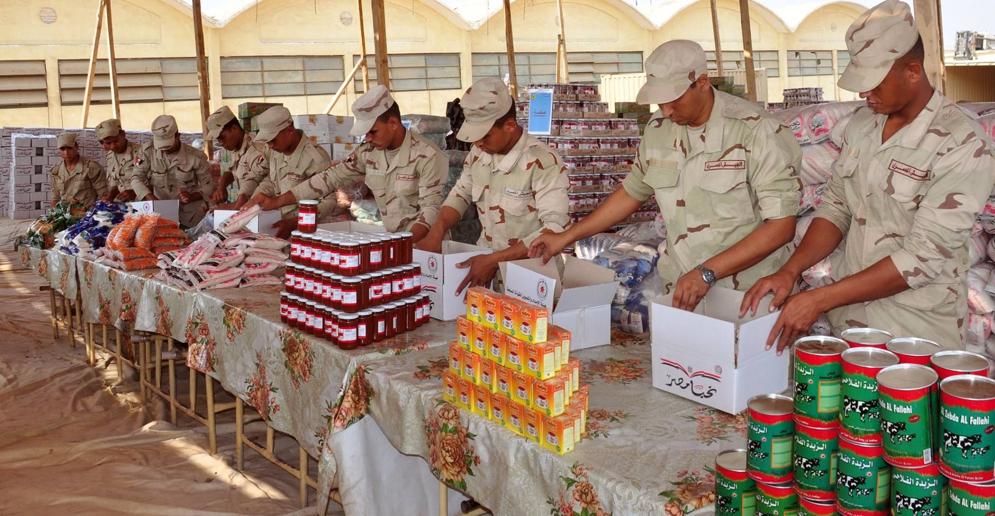 Army soldiers preparing food pack as a step intended to overcome economic hardships (Photo courtesy of Egypt's Army spokesman page on Facebook)