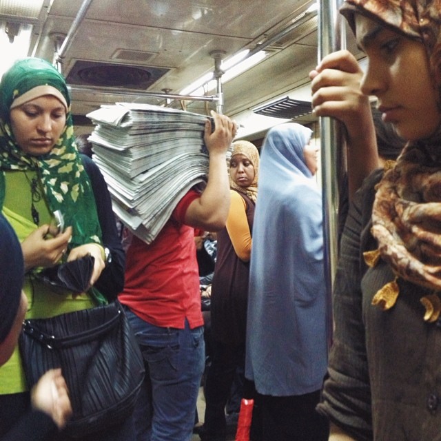 Photo by Christina Rizk Today's news is old news. On my way home after a long day covering protests around Cairo a man was selling newspapers on the women's metro car.