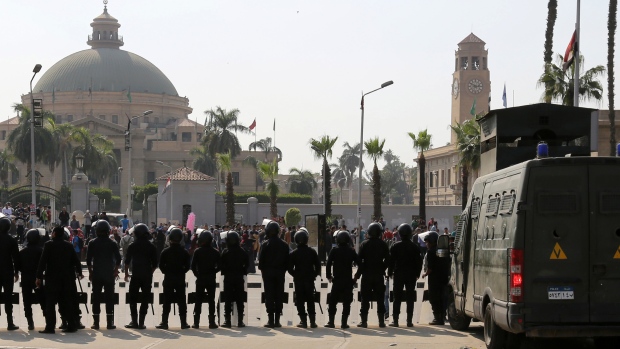 Riot police officers take positions in front of Cairo University plan a protest against former Defence Minister Field Marshal Abdel Fattah al-Sisi after he announced that he will run for presidential elections, March 30, 2014. Credit: Mohamed Abd El Ghany/Reuters