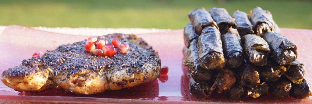 Roasted chicken with herbs and vine leaves with pomegranate concentrate for EGP 45.