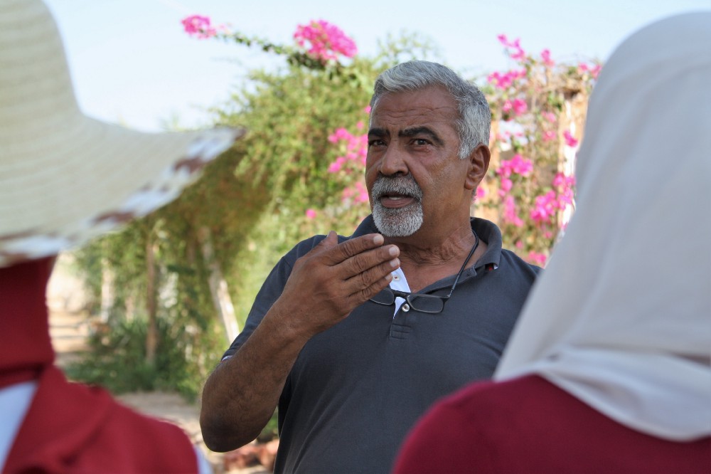 Maged el-Said shows visitors around Habiba Organic Farm. Credit: Enas El Masry